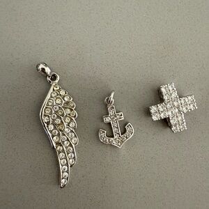 Elegant Silver-Tone Wing, Anchor, and Cross Pendant Set